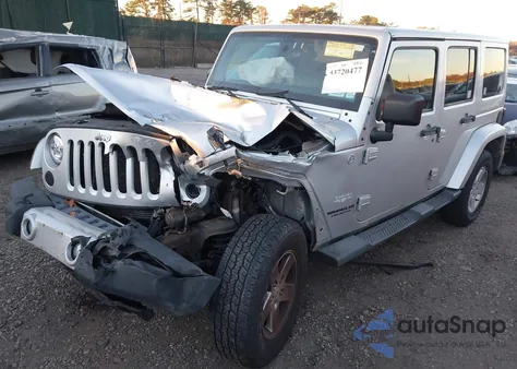 2011 Jeep Wrangler Unlimited Sahara из США, поврежденный, VIN 1J4HA5H12BL558910